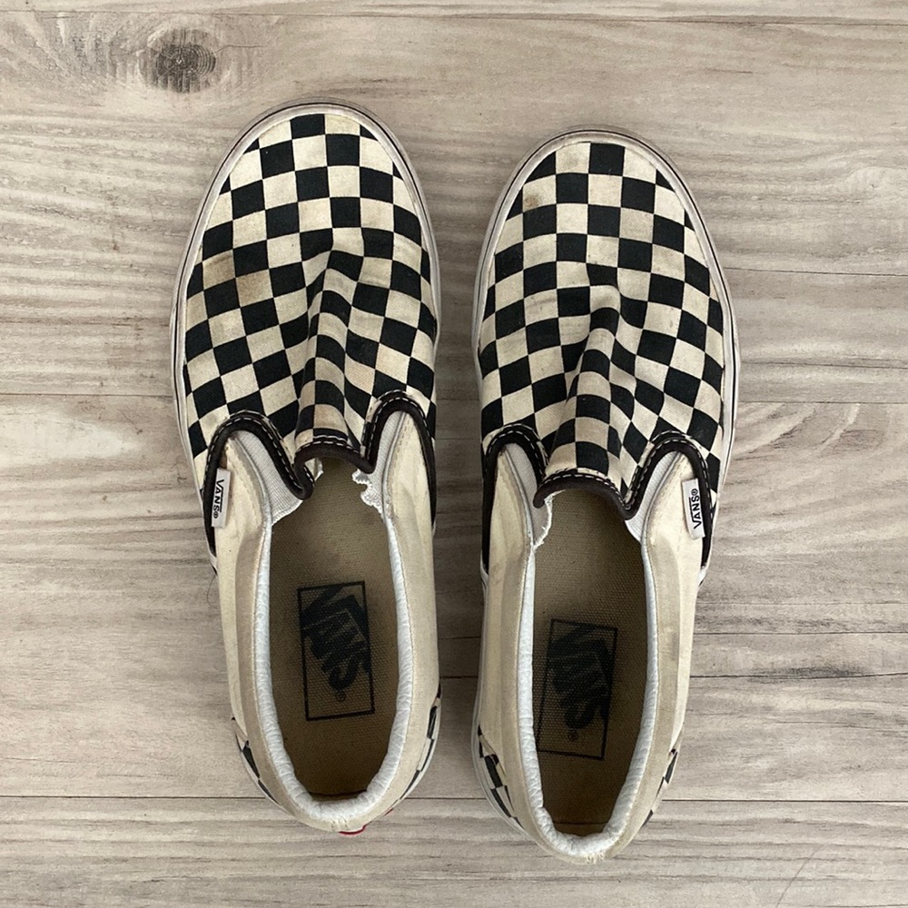 Checkered Vans slip on’s